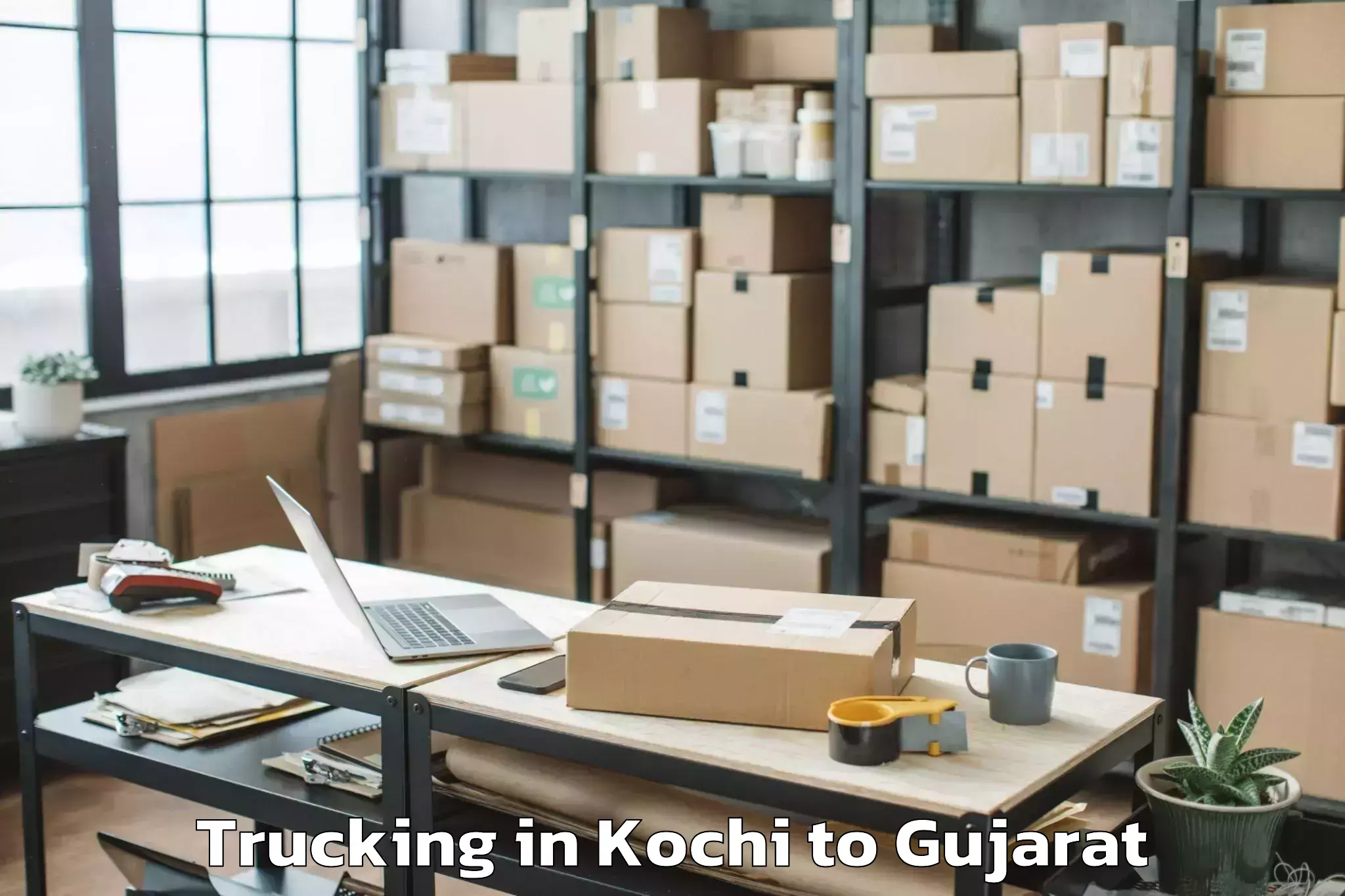 Top Kochi to Rashtriya Raksha University Ga Trucking Available